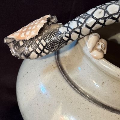 Sale Photo Thumbnail #18: Bill Campbell is known for his porcelain vessels & layered glazes. This vase features flowers as well as snake skin depiction.