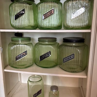 Sale Photo Thumbnail #717: This collection features vintage 1930s Anchor Hocking "Hoosier" ribbed green depression glass jars, made with uranium glass that glows brightly under a UV blacklight.