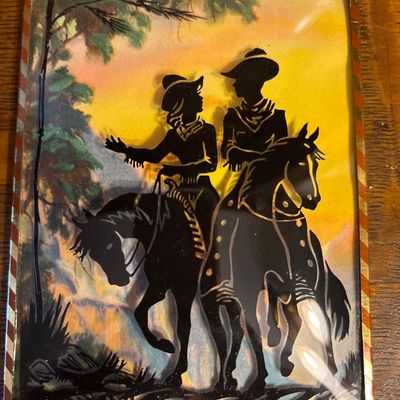 Sale Photo Thumbnail #978: Two vintage cowboy silhouette pictures