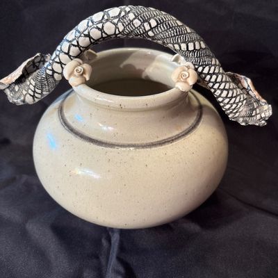Sale Photo Thumbnail #16: Bill Campbell is known for his porcelain vessels & layered glazes. This vase features flowers as well as snake skin depiction.