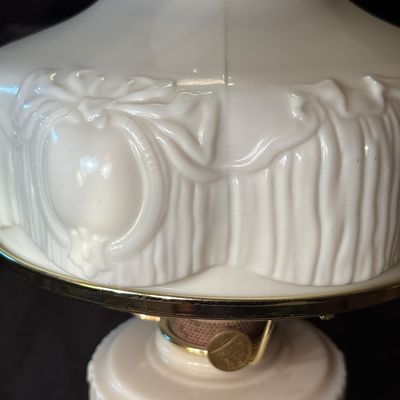 Sale Photo Thumbnail #213: This is a vintage Aladdin Tall Lincoln Drape mantle lamp in ivory Alacite glass, featuring a Nu-Type Model B burner. 26h x 11w.