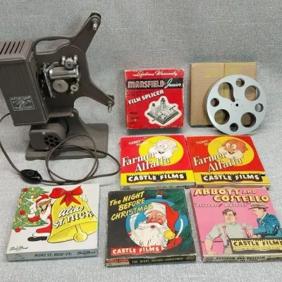Keystone Film Projector And 16mm Film Reels - Untested