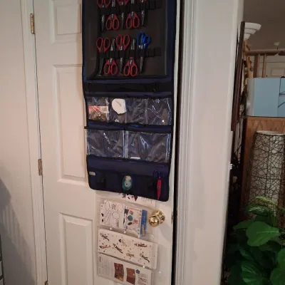 HANGING SCRAPBOOK ORGANIZER FILLED WITH SUPPLIES