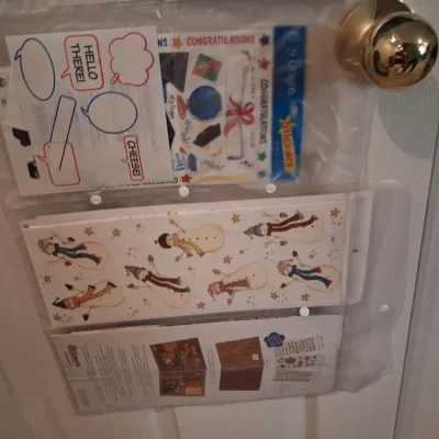 HANGING SCRAPBOOK ORGANIZER FILLED WITH SUPPLIES