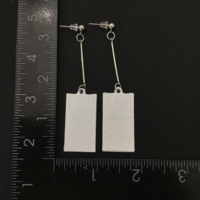 Tanjiro Kamado’s Hanafuda earrings