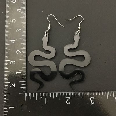 Black acrylic snake earrings