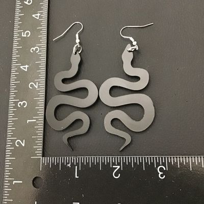 Black acrylic snake earrings