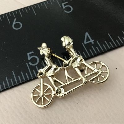 Sarah Coventry Bike Peddling Brooch