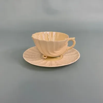 Vintage belleek neptune yellow shell teacup and saucer