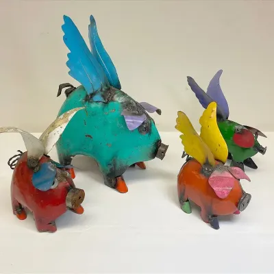 Vibrant metal winged pig art 17 tall and smaller