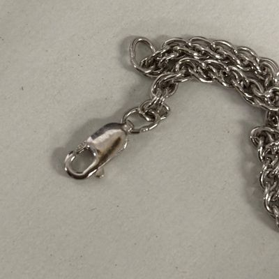 LOT 82: Natural Stone and 925 Silver Pendant 15.1gtw on a 925 Silver Chain 14.2g