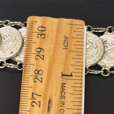 LOT 75: Alpaca Mexico Silver Inlaid Floral Cuff Bracelet, Coin Bracelet along with Dream Catcher Silvertone Earrings