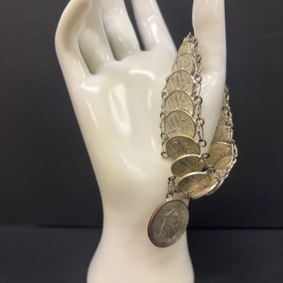 LOT 75: Alpaca Mexico Silver Inlaid Floral Cuff Bracelet, Coin Bracelet along with Dream Catcher Silvertone Earrings