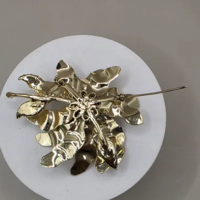 LOT: 59 Vintage Silver and Gold Tone Brooches, Pins, & Clip-Ons Royal Adderly, Coro, Boucher & More