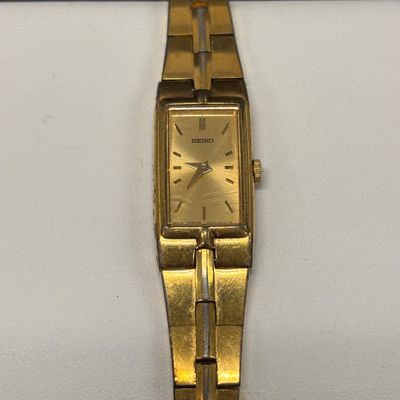 LOT 76: Collection of 3 Gold Tone Watches: Texas Instruments, Benrus & Seiko