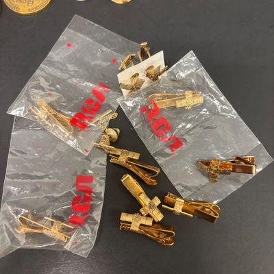 LOT 73: Vintage RCA Memorabilia: Patches, Tie Tacks, Tie Clips, Lapel Pins, Coasters, Pen