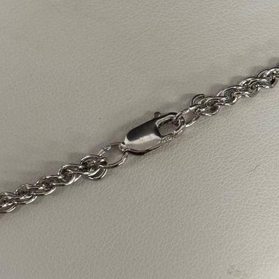 LOT 82: Natural Stone and 925 Silver Pendant 15.1gtw on a 925 Silver Chain 14.2g