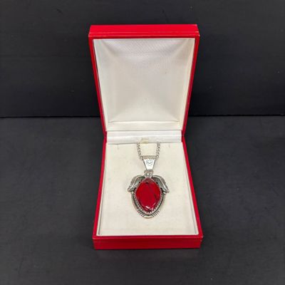 LOT 82: Natural Stone and 925 Silver Pendant 15.1gtw on a 925 Silver Chain 14.2g