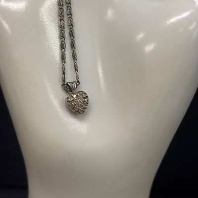 LOT 92: Vintage 14k Gold and Diamond Chip Pendant on a 925 Sterling Chain 4.3gtw