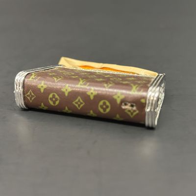 LOT 36: Vintage and Contemporary Lighters with Keychains & More