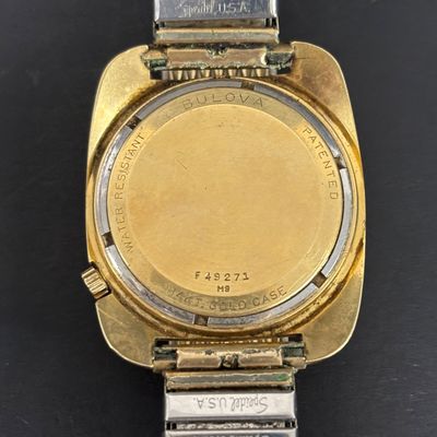 LOT 103: Bulova Accutron 14k Gold Case Watch F49271