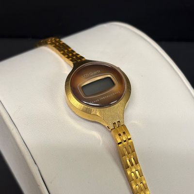 LOT 76: Collection of 3 Gold Tone Watches: Texas Instruments, Benrus & Seiko
