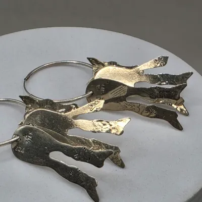LOT 55: Two Pairs of Vintage Sterling Silver Earrings (13.6gtw) and an Aztec Panel Bracelet with Inlaid Abalone