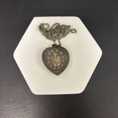 LOT 66: Sterling Miraculous Medal on Mother of Pearl Heart Pendant 7.6gtw (Silver-Tone Chain) with Sterling and Marcasite Miraculous...