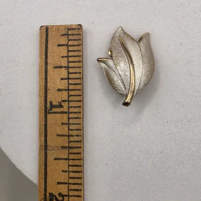 LOT 63: Vintage Gold Tone Brooches