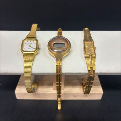 LOT 76: Collection of 3 Gold Tone Watches: Texas Instruments, Benrus & Seiko