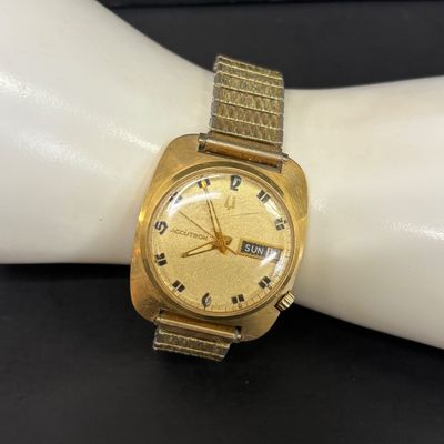 LOT 103: Bulova Accutron 14k Gold Case Watch F49271