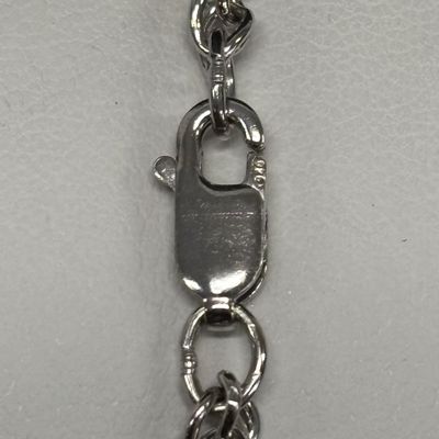 LOT 82: Natural Stone and 925 Silver Pendant 15.1gtw on a 925 Silver Chain 14.2g