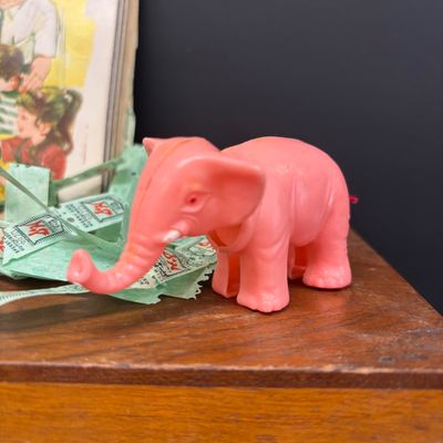 LOT 42: Vintage Quick Saver Books of Green Stamps, Photomatic Photo Booth Photos, Small Pink Plastic Bobble Head Elephant & More