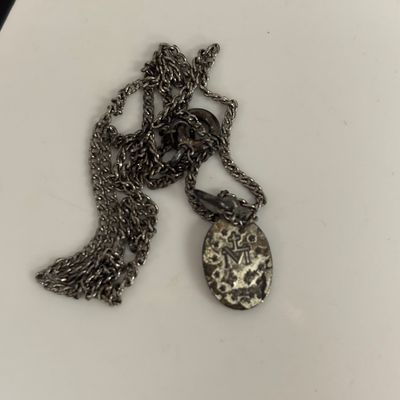 LOT 66: Sterling Miraculous Medal on Mother of Pearl Heart Pendant 7.6gtw (Silver-Tone Chain) with Sterling and Marcasite Miraculous...