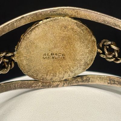 LOT 75: Alpaca Mexico Silver Inlaid Floral Cuff Bracelet, Coin Bracelet along with Dream Catcher Silvertone Earrings
