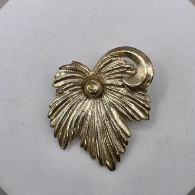 LOT 63: Vintage Gold Tone Brooches