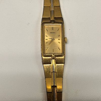LOT 76: Collection of 3 Gold Tone Watches: Texas Instruments, Benrus & Seiko