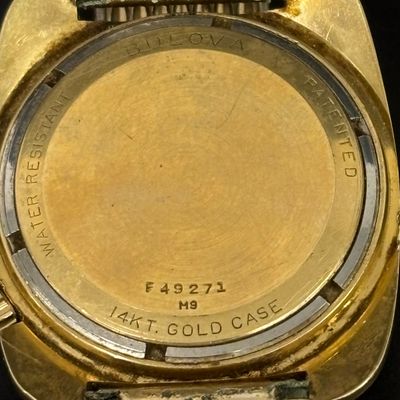 LOT 103: Bulova Accutron 14k Gold Case Watch F49271