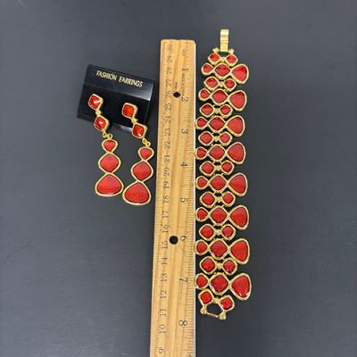 LOT 41: Vintage Belts, Red Enamel Costume Jewelry, Cat-Themed Ashtray and Pin & More