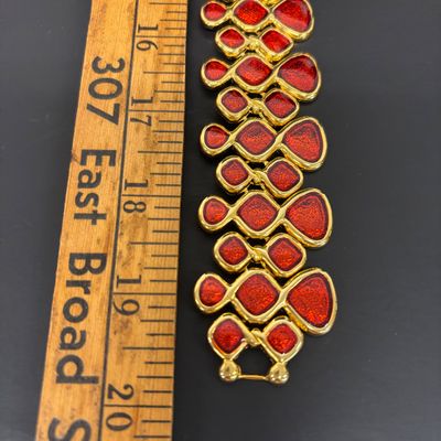 LOT 41: Vintage Belts, Red Enamel Costume Jewelry, Cat-Themed Ashtray and Pin & More