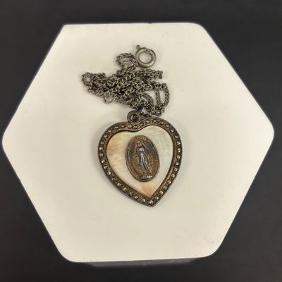LOT 66: Sterling Miraculous Medal on Mother of Pearl Heart Pendant 7.6gtw (Silver-Tone Chain) with Sterling and Marcasite Miraculous...