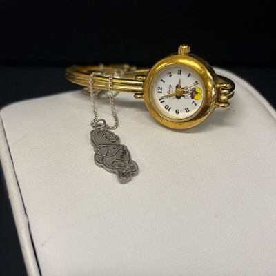 LOT 65: Sterling Silver Winnie the Pooh Pendant on Silver-Tone Chain, Mickey Mouse Watch & Bugs Bunny Necklace and Pin