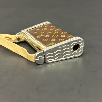 LOT 36: Vintage and Contemporary Lighters with Keychains & More