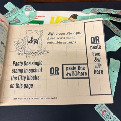 LOT 42: Vintage Quick Saver Books of Green Stamps, Photomatic Photo Booth Photos, Small Pink Plastic Bobble Head Elephant & More