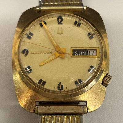 LOT 103: Bulova Accutron 14k Gold Case Watch F49271