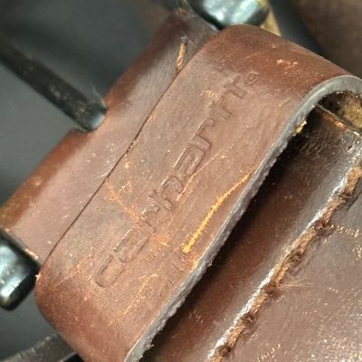 LOT 37: Tony Laina Leather Belt Buckle, USA-Themed Pins, US Mint Independence Hall Coins & More