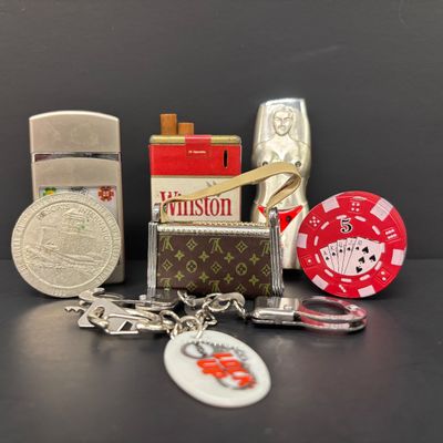 LOT 36: Vintage and Contemporary Lighters with Keychains & More