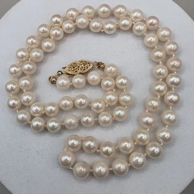 LOT: 56 Vintage Culture Pearl Demi Parure Necklace 20" Bracelet 9" with 14k Closures.