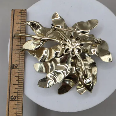 LOT: 59 Vintage Silver and Gold Tone Brooches, Pins, & Clip-Ons Royal Adderly, Coro, Boucher & More