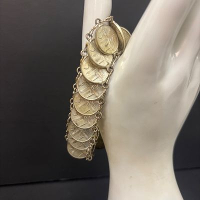 LOT 75: Alpaca Mexico Silver Inlaid Floral Cuff Bracelet, Coin Bracelet along with Dream Catcher Silvertone Earrings